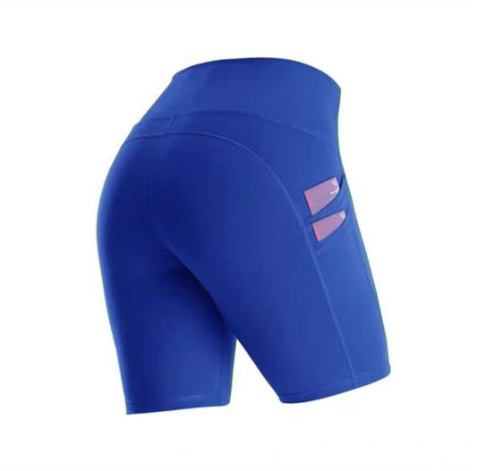 Shorts ciclistas deportivos de color azul real para mujer (DRI-FIT ADV) - con bolsillos