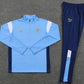 Manchester City Light Blue, White & Gold Accent Quarter Zipper Tracksuit (DRI-FIT ADV)