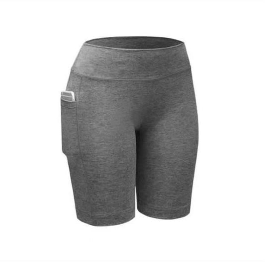 Pantalones cortos ciclistas de fitness para mujer en gris espacial (DRI-FIT ADV) - con bolsillos